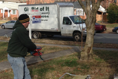 Crew member hauling junk in Oakton Virginia